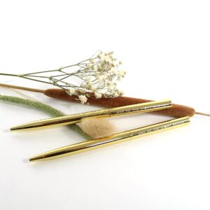 Shiny gold pen - AND SO THE STORY BEGINS